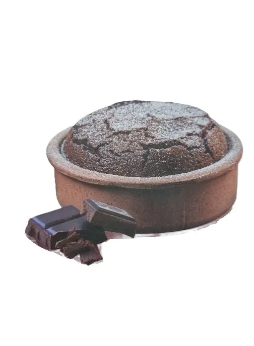 Individual chocolate soufflé with a molten centre, dusted with icing sugar.