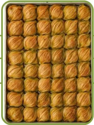 Midye (mussel-shaped) baklava with pistachio.