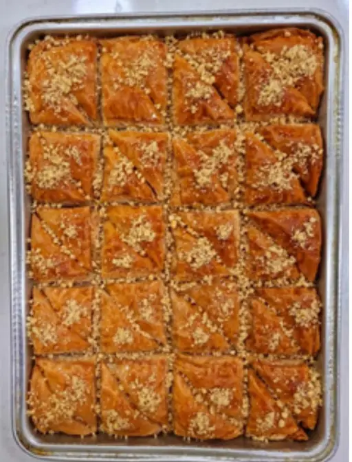 Cevizli muska — triangular filo parcels filled with walnut.