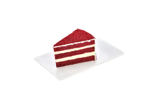 Red velvet layer cake with white cream filling.