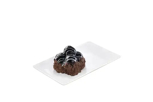 Profiterole mono cake with a chocolate base and cream swirls.