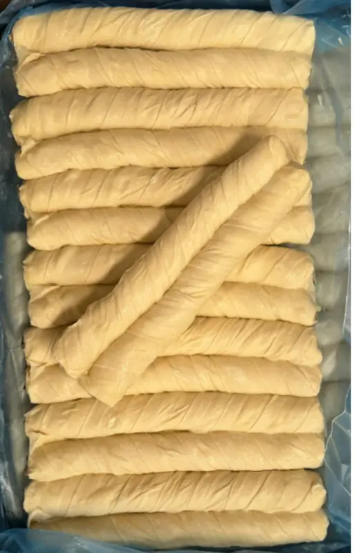 Twisted double pastry roll filled with mushroom and potato, ready to bake from frozen.
