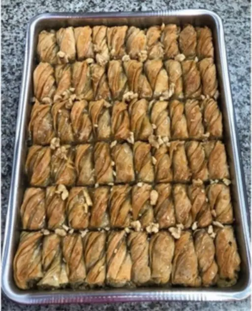 Cevizli burma — twisted rolled pastry filled with walnut.