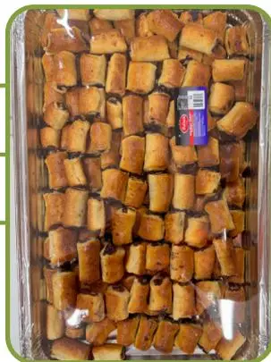 Date kulicha — golden bread rolls filled with dates.