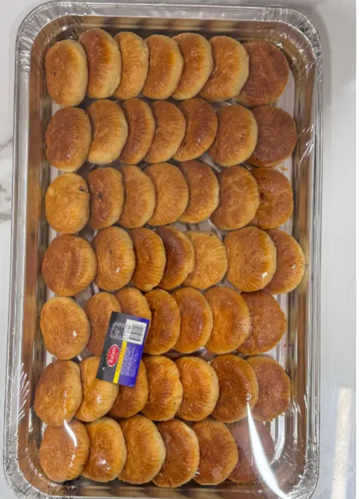 Walnut kulicha — golden bread rolls with walnut.