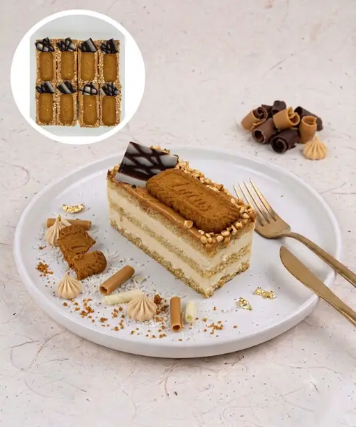 Layered slice cake with hazelnut spread and Lotus Biscoff.