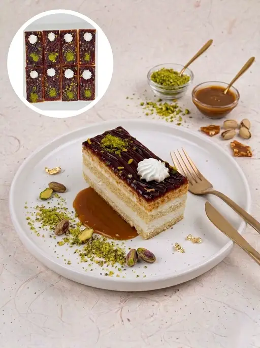 Layered slice cake with caramel and pistachio.