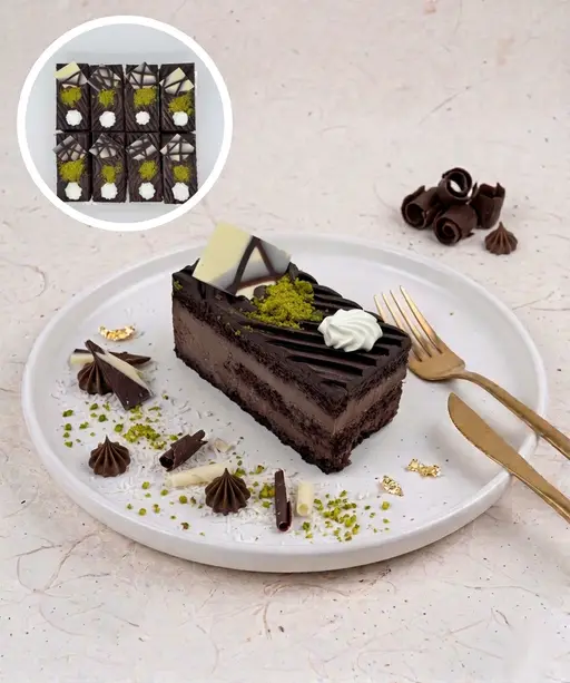 Layered chocolate slice cake with cream.