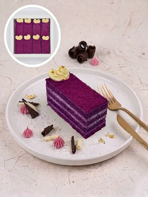 Layered purple velvet slice cake.