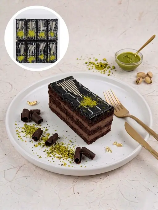 Layered chocolate slice cake with cream.