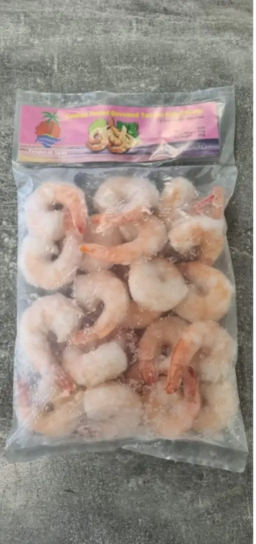 Frozen king prawns, shell-on.