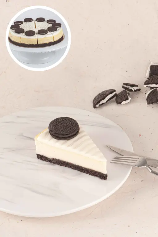 Cheesecake on a cocoa biscuit base, topped with a chocolate sandwich biscuit.