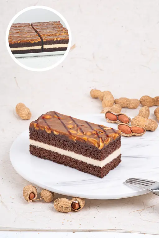 Caramel cake coated in caramelised peanuts.