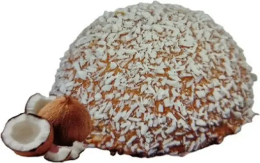 Caramel-glazed dome cake covered in shredded coconut.